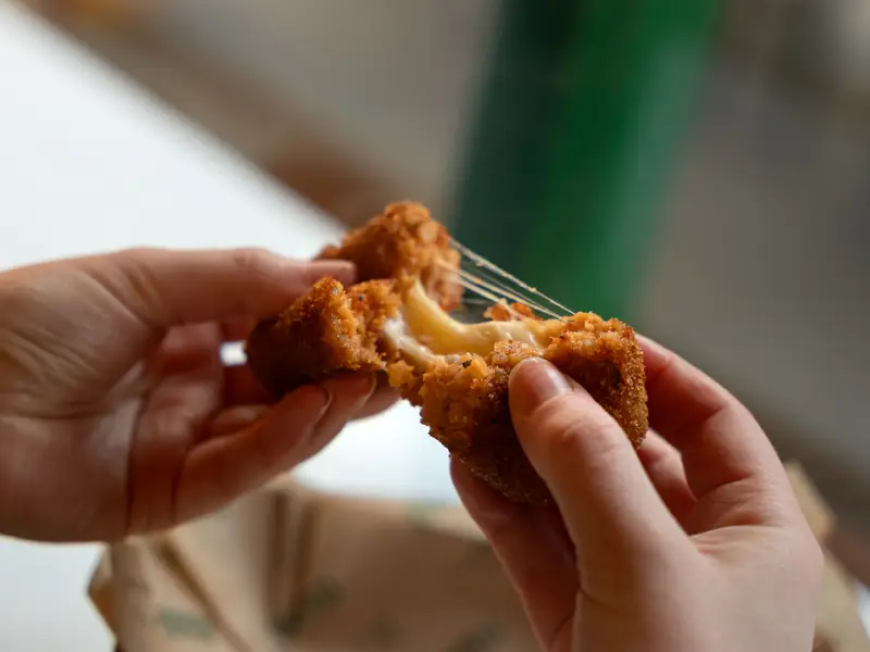 Arancini being eaten